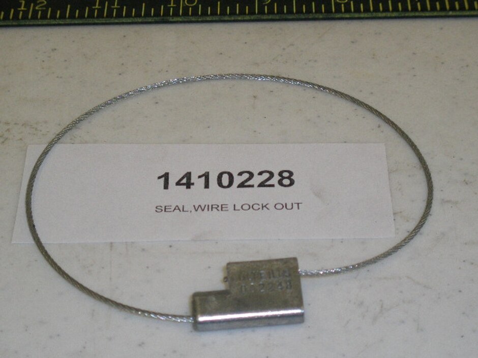 SEAL,WIRE LOCK OUT