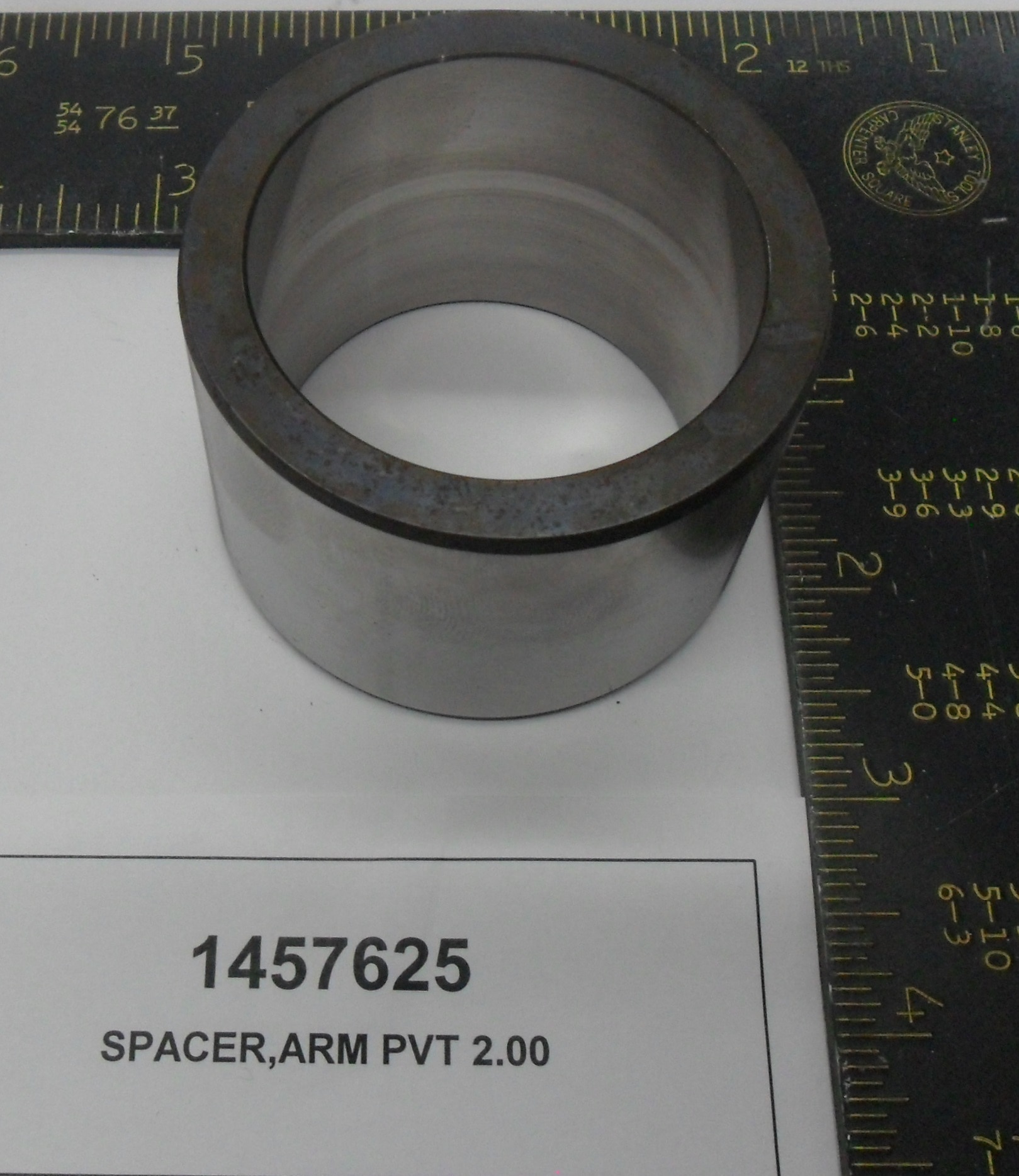 SPACER,ARM PVT 2.00
